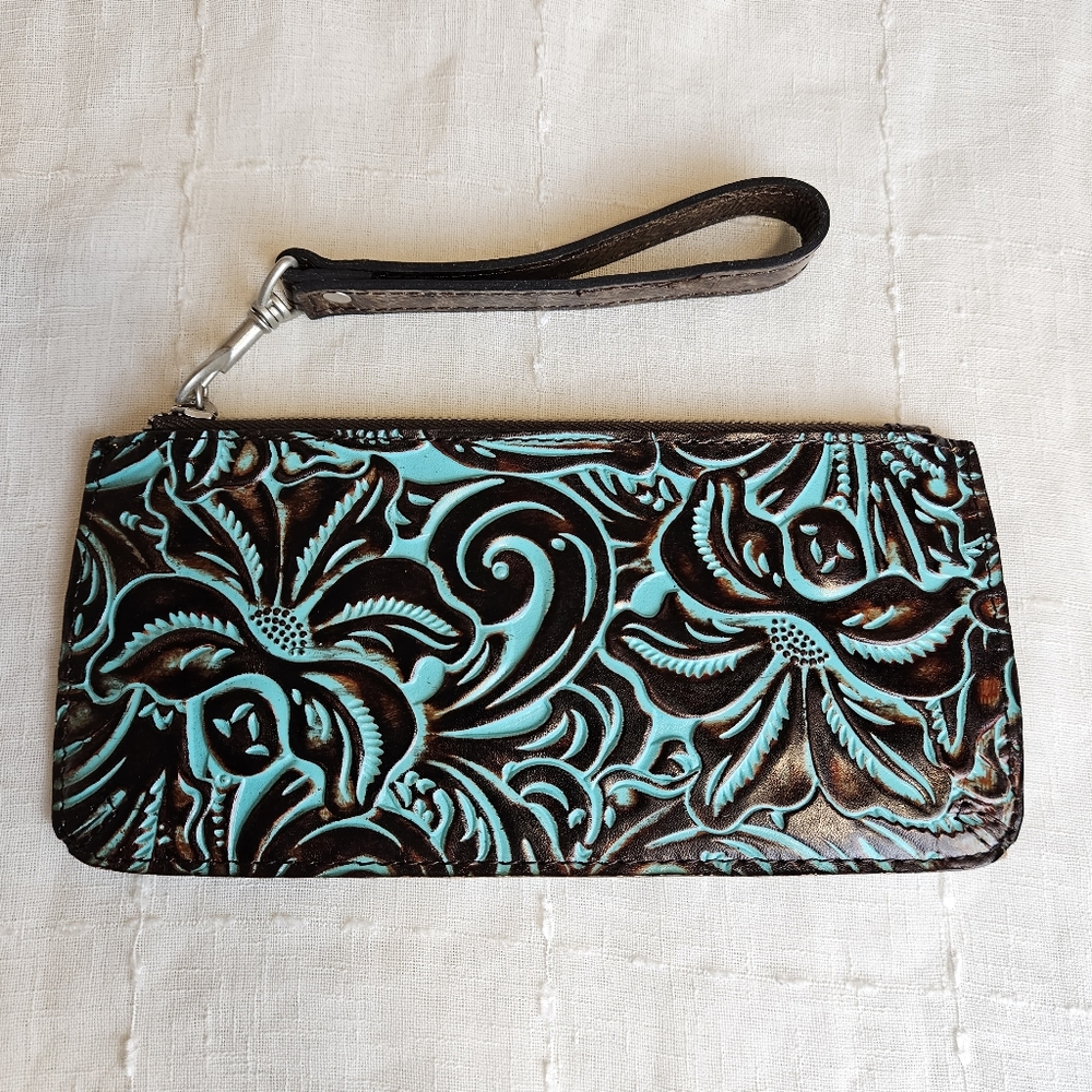 Patricia Nash leather clutch bag with removable strap.  zipper closure.